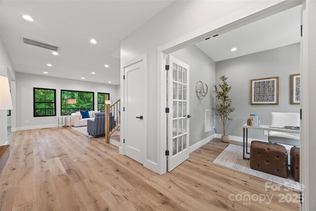 1 Linestowe Dr, Belmont, NC 28012 - hallway featuring baseboards, visible vents, light wood-style floors, and stairway
