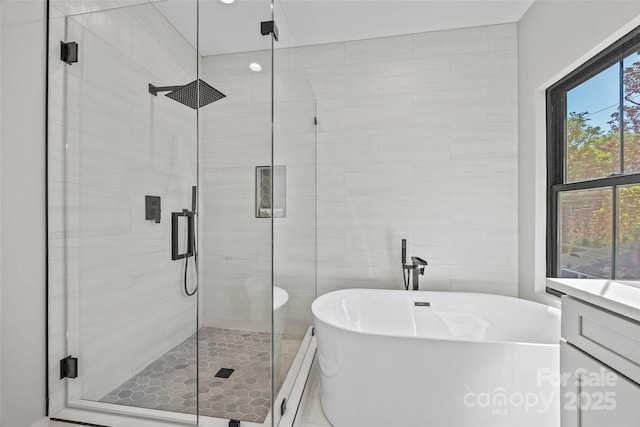 1 Linestowe Dr, Belmont, NC 28012 - full bathroom featuring a shower stall, a freestanding bath, and baseboard heating