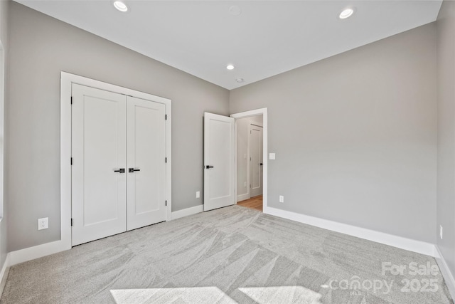 1 Linestowe Dr, Belmont, NC 28012 - unfurnished bedroom featuring recessed lighting, baseboards, a closet, and carpet