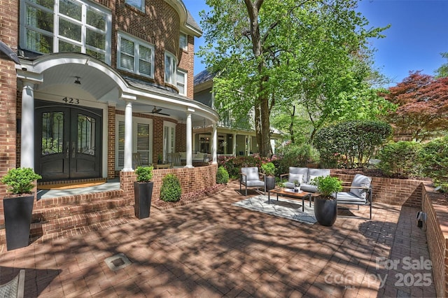423 N Pine St, Charlotte, NC 28202 - view of patio featuring covered porch, french doors, and an outdoor hangout area