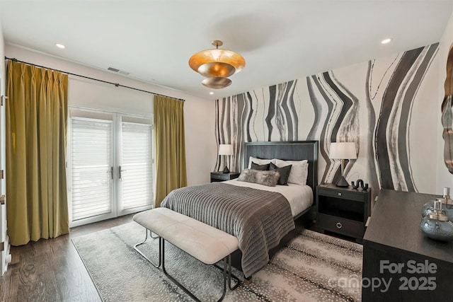 423 N Pine St, Charlotte, NC 28202 - bedroom with recessed lighting, visible vents, access to exterior, and wood finished floors