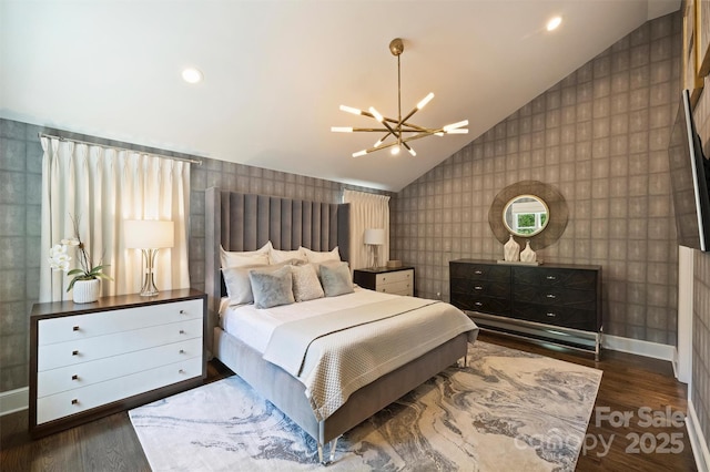423 N Pine St, Charlotte, NC 28202 - bedroom with wood finished floors, a chandelier, vaulted ceiling, and wallpapered walls