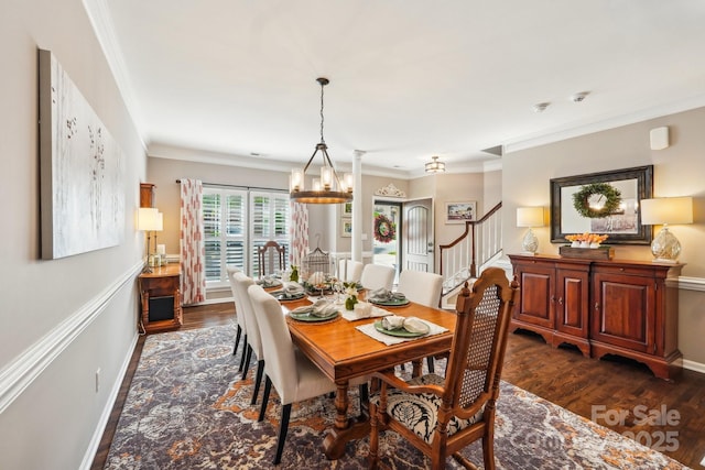 dining room featuring baseboards, a notable chandelier, stairs, crown molding, and dark wood-type flooring