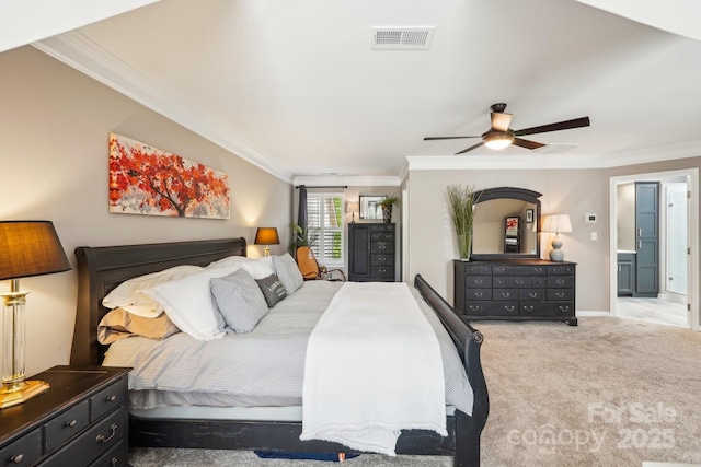 bedroom featuring carpet, visible vents, crown molding, and baseboards