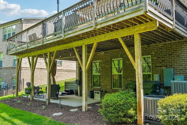 view of patio / terrace featuring central AC and a deck