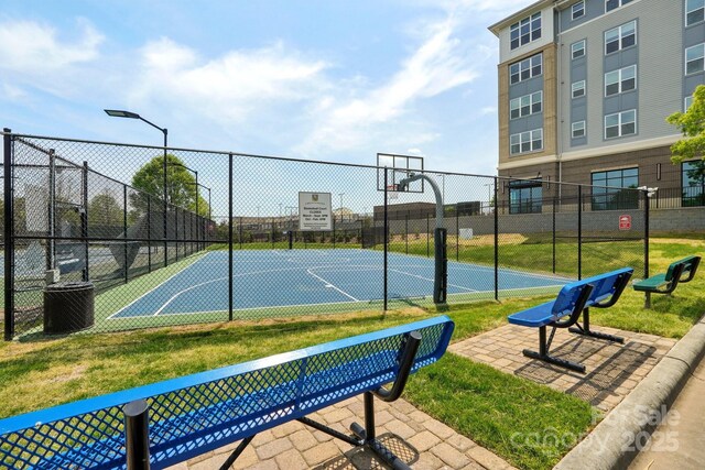 view of sport court with community basketball court and fence