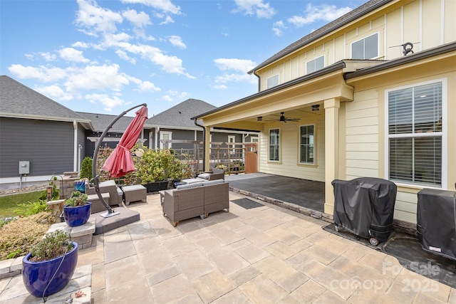 view of patio featuring outdoor lounge area, area for grilling, ceiling fan, and fence