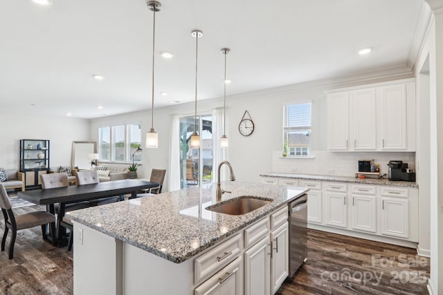 15108 Autumn Sage Dr, Charlotte, NC 28278 - kitchen featuring dishwasher, a sink, dark wood finished floors, white cabinetry, and a kitchen island with sink