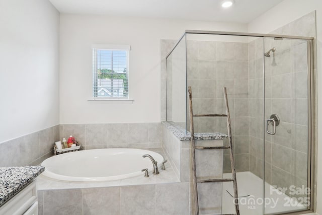15108 Autumn Sage Dr, Charlotte, NC 28278 - bathroom featuring a garden tub, a shower stall, and vanity