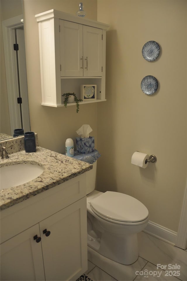 5817 Wingate Hill Rd, Denver, NC 28037 - bathroom with toilet, vanity, and baseboards