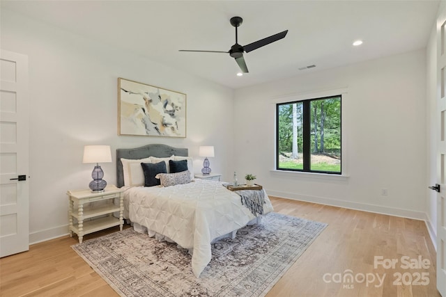 bedroom featuring recessed lighting, a ceiling fan, visible vents, light wood-style flooring, and baseboards