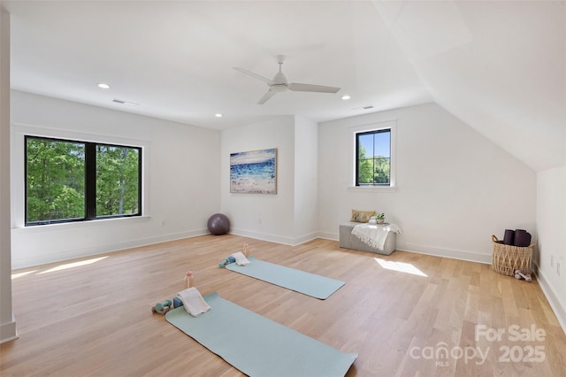 exercise area with visible vents, wood finished floors, ceiling fan, and recessed lighting