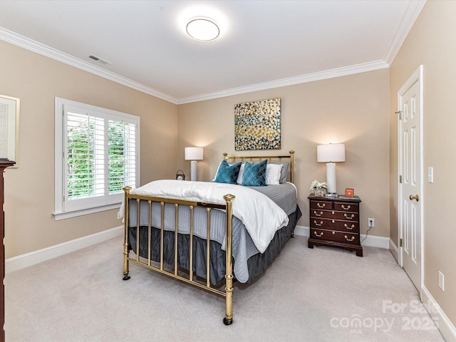 carpeted bedroom with baseboards, visible vents, and ornamental molding