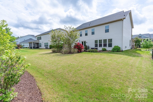 16711 Monocacy Blvd, Huntersville, NC 28078 - rear view of house featuring a yard