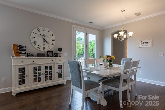 16711 Monocacy Blvd, Huntersville, NC 28078 - dining area featuring crown molding, visible vents, baseboards, an inviting chandelier, and dark wood finished floors