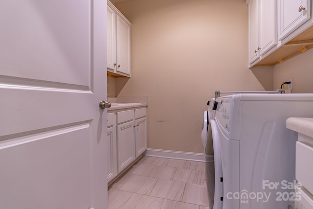 16711 Monocacy Blvd, Huntersville, NC 28078 - laundry area with separate washer and dryer, cabinet space, and baseboards