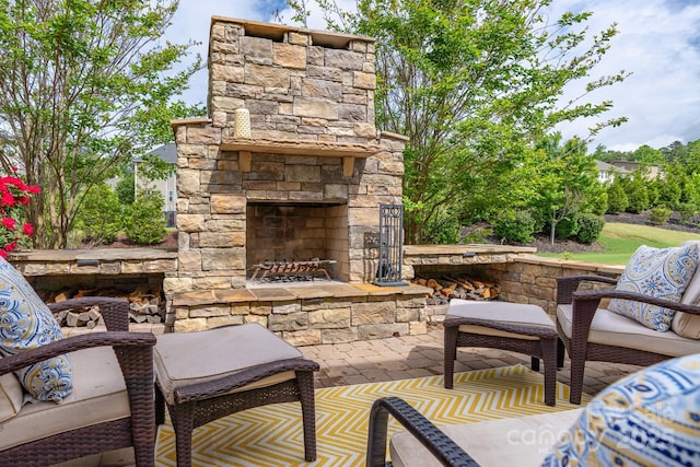 16711 Monocacy Blvd, Huntersville, NC 28078 - view of patio / terrace featuring an outdoor stone fireplace