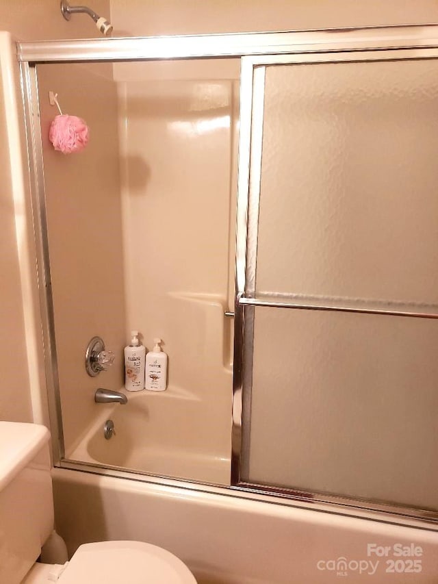 134 Raven Rdg, Maggie Valley, NC 28751 - bathroom with toilet and bath / shower combo with glass door