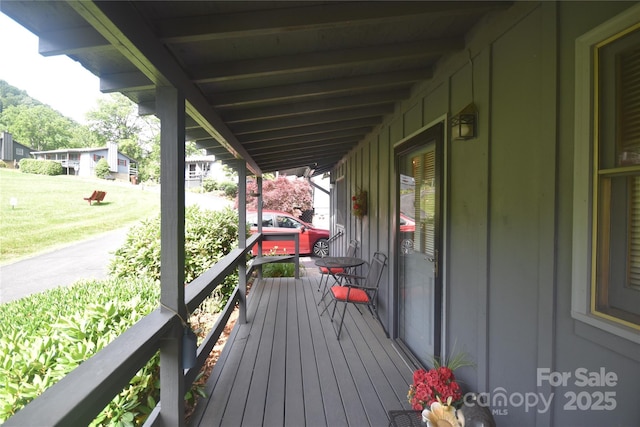 134 Raven Rdg, Maggie Valley, NC 28751 - porch featuring a yard