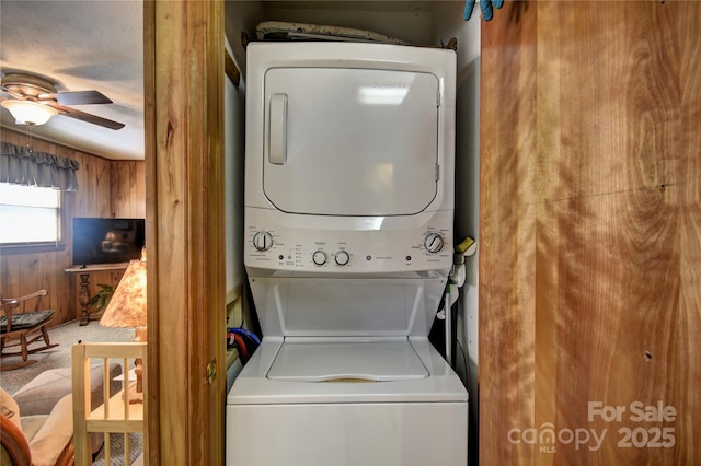 134 Raven Rdg, Maggie Valley, NC 28751 - laundry area featuring stacked washer / drying machine and a ceiling fan