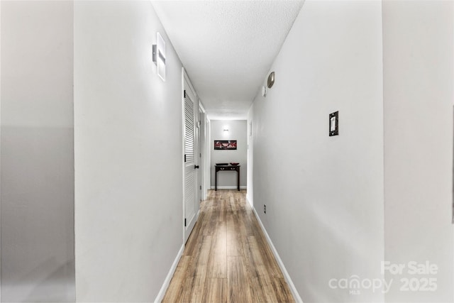 123 Carriage House Dr, Kannapolis, NC 28081 - hall with light wood-type flooring and baseboards