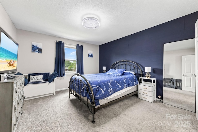 123 Carriage House Dr, Kannapolis, NC 28081 - carpeted bedroom featuring a textured ceiling and baseboards