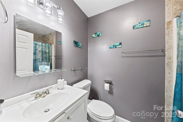 123 Carriage House Dr, Kannapolis, NC 28081 - full bath with vanity, toilet, and a shower with curtain