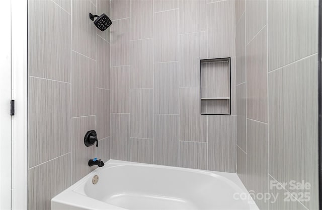 bathroom featuring bathing tub / shower combination