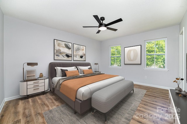 1640 English Knoll Dr, Matthews, NC 28105 - bedroom featuring wood finished floors, baseboards, and ceiling fan