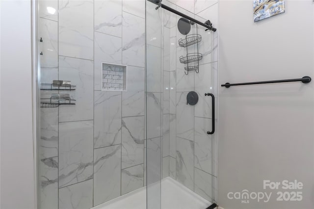 bathroom featuring a stall shower