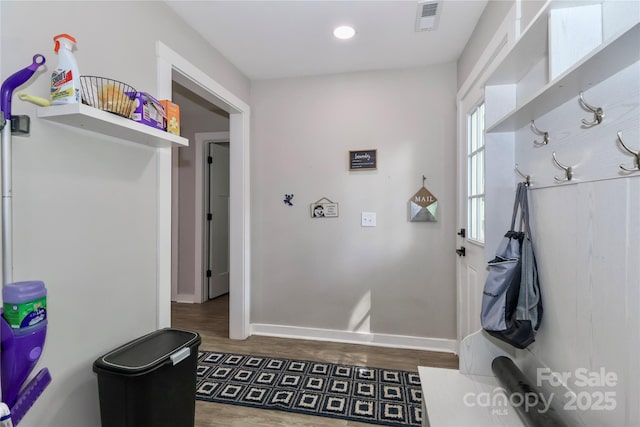 mudroom with wood finished floors, baseboards, and recessed lighting