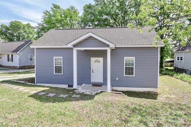 703 S Main St, Landis, NC 28088 - bungalow-style house featuring a front lawn and roof with shingles