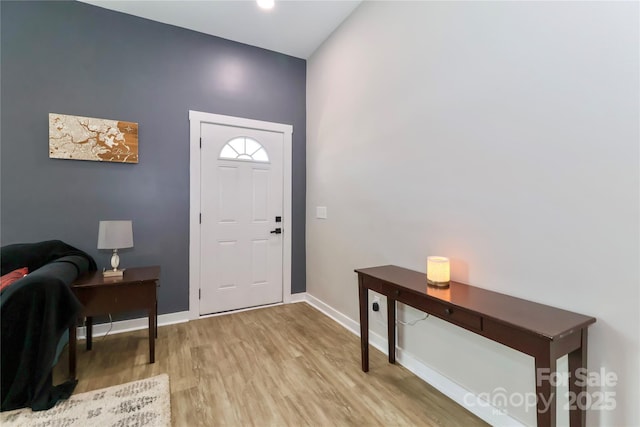 703 S Main St, Landis, NC 28088 - foyer with light wood finished floors and baseboards