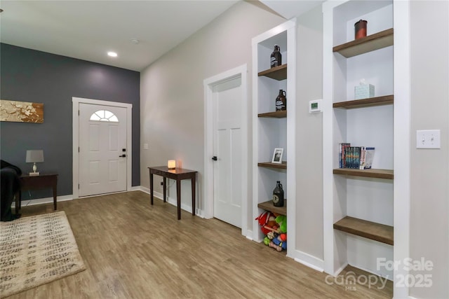 703 S Main St, Landis, NC 28088 - foyer with wood finished floors and baseboards