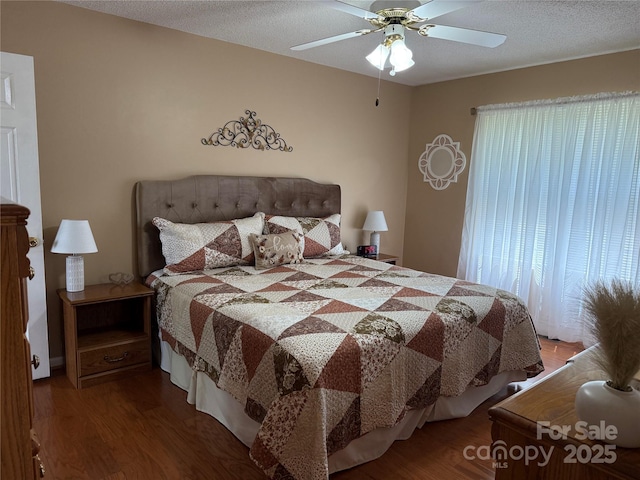 bedroom featuring ceiling fan and wood finished floors