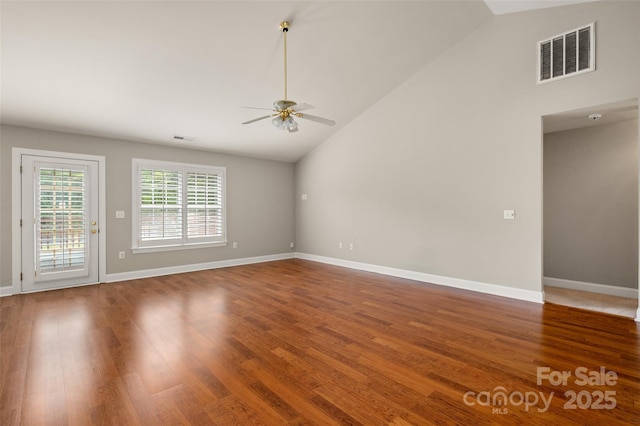 2412 Laura Dr, Charlotte, NC 28212 - empty room featuring baseboards, visible vents, a ceiling fan, wood finished floors, and high vaulted ceiling