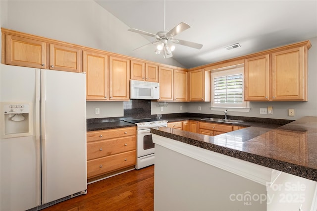 2412 Laura Dr, Charlotte, NC 28212 - kitchen featuring light brown cabinetry, a sink, visible vents, lofted ceiling, and white appliances