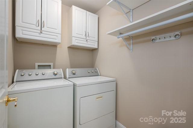 2412 Laura Dr, Charlotte, NC 28212 - washroom featuring cabinet space and independent washer and dryer