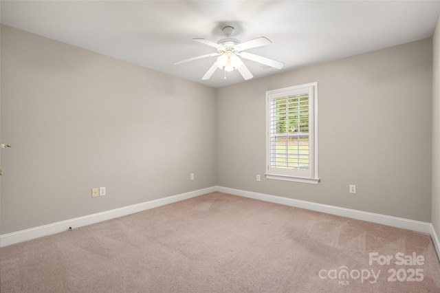 2412 Laura Dr, Charlotte, NC 28212 - spare room with light colored carpet, ceiling fan, and baseboards