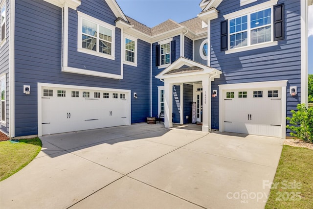 14925 Baldridge Dr, Huntersville, NC 28078 - view of front of property featuring an attached garage and concrete driveway