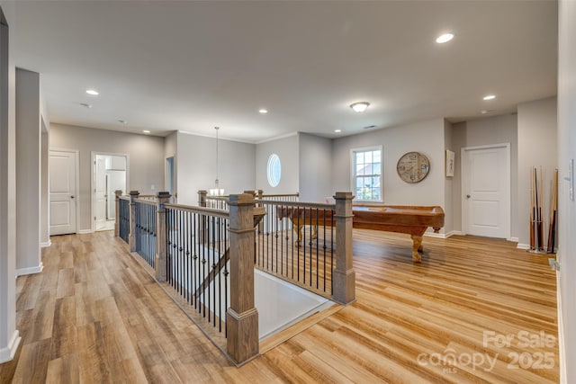 14925 Baldridge Dr, Huntersville, NC 28078 - hallway with light wood finished floors, recessed lighting, baseboards, and an upstairs landing