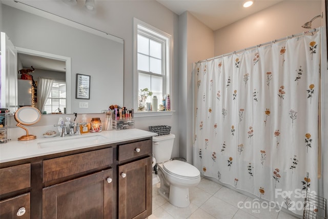 14925 Baldridge Dr, Huntersville, NC 28078 - full bathroom with healthy amount of natural light, tile patterned floors, toilet, and vanity