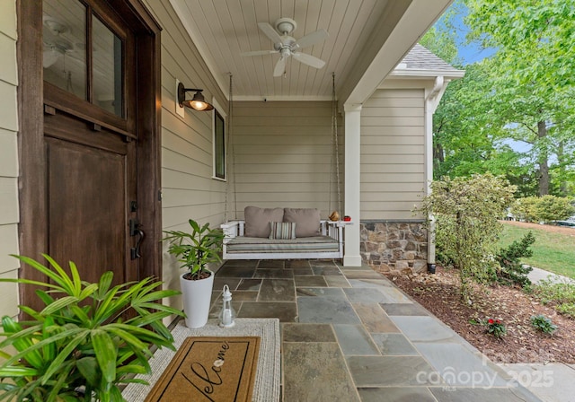 view of patio / terrace with a porch and ceiling fan