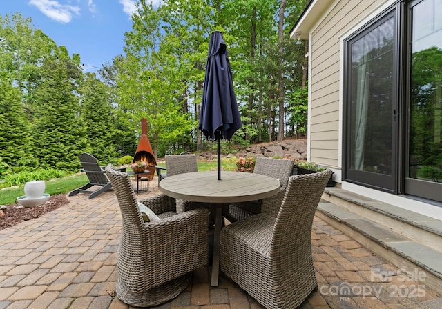 view of patio with outdoor dining space