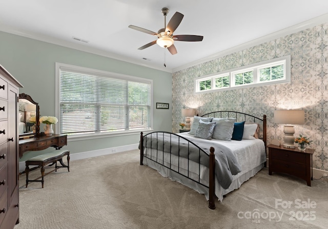 bedroom featuring wallpapered walls, visible vents, baseboards, and light colored carpet