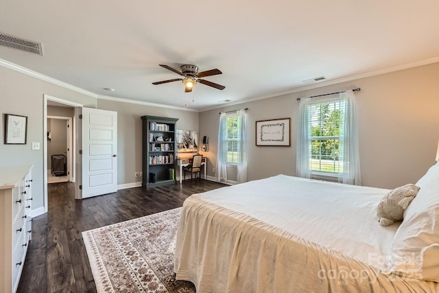 bedroom featuring baseboards, visible vents, ornamental molding, and dark wood-type flooring