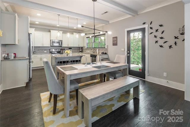 dining space with beam ceiling, dark wood-type flooring, recessed lighting, and baseboards