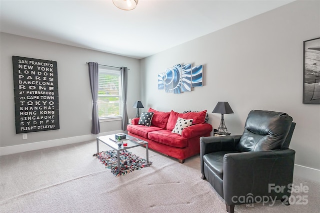 carpeted living room featuring baseboards