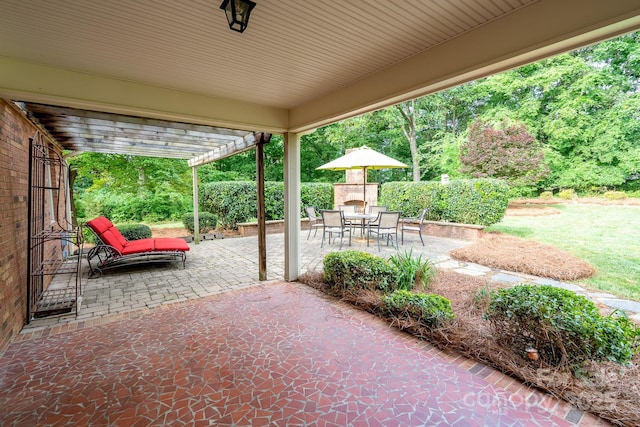 view of patio / terrace featuring outdoor dining area and a pergola