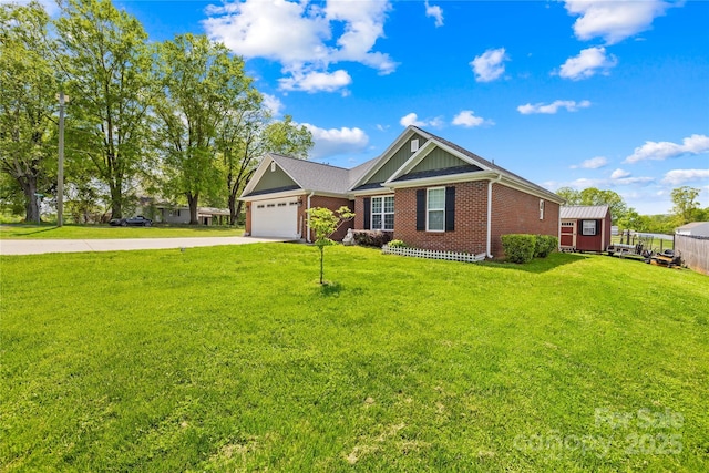 ranch-style home with a front lawn, driveway, brick siding, and a garage